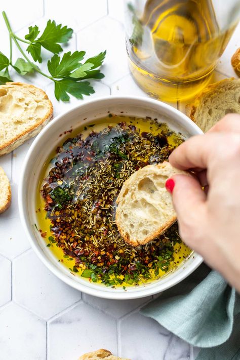 Making your own olive oil bread dip is incredibly easy. This bread dipping oil recipe is made with just a few flavorful ingredients like balsamic vinegar and garlic, and it can be ready in minutes. Serve it as an appetizer or alongside your favorite pasta dish, and you'll feel like you're at your favorite Italian restaurant without even leaving your house. Oil Bread Dip Recipe, Bread Dipping Sauce, Olive Oil Bread Dip, Oil Bread Dip, Bread Dipping Oil Recipe, Dipping Oil Recipe, Olive Oil Dip For Bread, Olive Oil Dip, Bread Dipping Oil