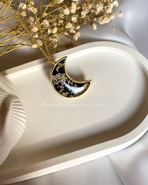 floral crescent moon pendant, made with real flowers preserved in resin! 🌸 Want to wear this beautiful piece? Tap to shop and follow for more magical designs! 💕 @_resindelights . . . . . . . . . . . #JewelryProcess #ResinJewelry #HandmadeWithLove #NatureInspired #viralpost #uk #uae #trending #explorepage #jewelry #handmade #resinartpakistan #resinartist #resinjewellery #supportsmallbusiness #shopsmall #shoplocal #resin #etsyfinds #pinterstgirl #floralvibes #lunar #moonjewelry Resin Moon Pendant, Floral Crescent Moon, Crescent Moon Pendant, Moon Jewelry, Viral Post, Moon Pendant, Real Flowers, Jewelry Handmade, Resin Jewelry