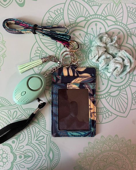 These safety lanyards are great for everyday use, on vacations, or on campus! Conveniently able to hold an ID and three cards of choice. Comes with the badge holder/wallet, matching lanyard, personal alarm with built in flashlight, tassel keychain & a scrunchie to match 🖤 Id Wallet, Tassel Keychain, Badge Holder, Badge Holders Lanyard, Badge Holders, Flashlight, Lanyard, Wallet, Band