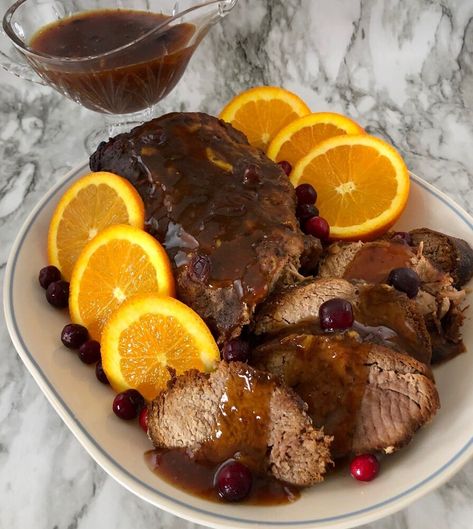 Cranberry Orange Glazed Pork Loin is an easy slow cooker recipe with the delicious flavors of cranberry and orange over a tender pork loin. All you need to do is brown the pork loin, make the sauce, cook the pork loin with the sauce in a slow cooker for 8 hours, thicken the sauce and serve. It is simple and delicious. This is yummy any time of year but, it is especially good and fun to make during the holidays. Cranberry and orange go so well together and cranberry recipes are perfect… Tender Pork Loin, Glazed Pork Loin, Orange Pork, Cream Cheese Coffee Cake, Sweet Pork, Glazed Pork, Pork Loin Recipes, Stove Top Recipes, Pork Glaze