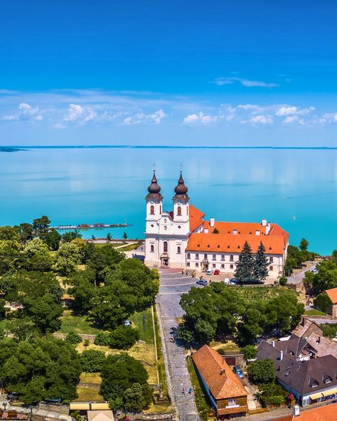 Take a day trip to Lake Balaton from Budapest 🌊 Missing the beach? The expansive, shimmering Lake Balaton is where landlocked Hungarians longing for a swim go to take a dip! Most visitors prefer to take the hassle out of the trip and simply book a tour. It’s often the most affordable option too. 🏞️ Are you planning a visit to Lake Balaton? Tag your travel buddy in the comments! ⬇️ - - - #budapest #budapesthungary #budapesttravel #budapestcity #budapest_hungary #visitbudapest #travelhunga... Lakeside Village, Lake Balaton, Budapest City, Visit Budapest, Most Beautiful Places To Visit, Hungary Travel, Budapest Travel, Lens Photography, Travel Buddy