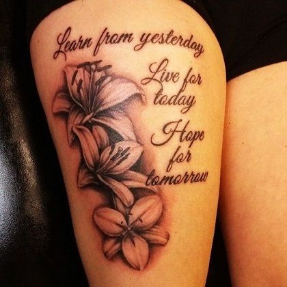 100 Popular Tattoo Designs and Meanings for Men & Women Tattoos For Women On Thigh, Thigh Tattoo Quotes, Wörter Tattoos, Lillies Tattoo, Lily Tattoo Design, Thigh Tattoo Designs, Snakebites, Live For Today, Inspiration Tattoos