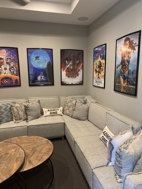 Game Room And Movie Room Ideas, Movie Theme Home Decor, Tv Wall Ideas Gameroom, Movie Theater Living Room Ideas Diy, Diy Basement Movie Room, Home Theater Movie Poster Ideas, Dream Basement Ideas Awesome, Upstairs Tv Room Ideas, Small Office Hangout Room Ideas