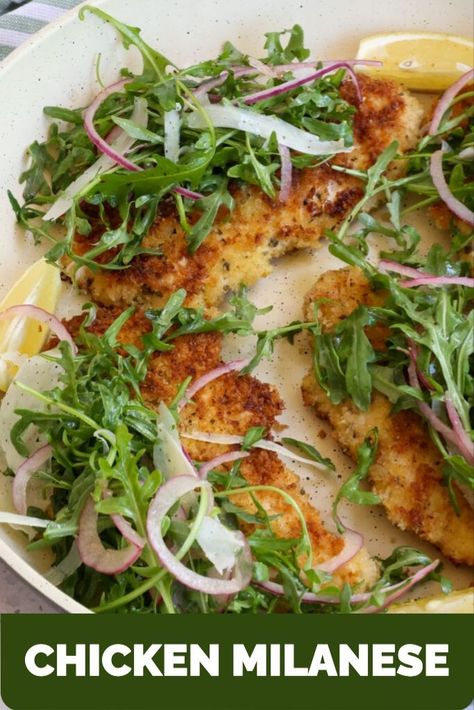 This Chicken Milanese Recipe is an Italian dish with thin chicken breasts breaded with seasoned bread crumbs and pan fried in butter. Then it is topped with a simple arugula and red onion salad that has been tossed with a lemon and olive oil dressing and sprinkled with shaved Parmesan Cheese. Serve it with fresh lemon wedges for light spritzing. Chicken Milanese Recipe, Light Chicken Recipes, Arugula Salad Dressing, Italian Chicken Breast, Milanese Recipe, Pan Fried Chicken Breast, Arugula Pasta, Chicken Milanese, Lemon Chicken Pasta