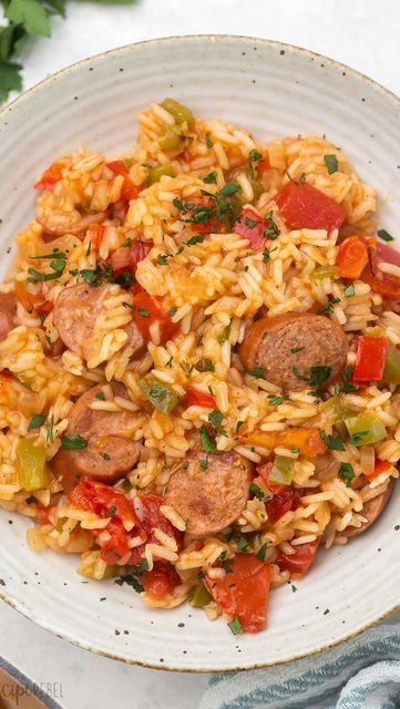 Ashley | Easy Family Meals on Instagram: "One Pan Sausage and Rice for this week’s meal plan 🙌 Made in 30ish minutes with fire-roasted tomatoes, onions, bell peppers, garlic, and smoked sausage. Get the recipe at the link in my profile @thereciperebel 👈👈 https://www.thereciperebel.com/one-pan-sausage-and-rice/ #smokedsausage #onepanmeal #onepotmeal #easydinner #dinnerrecipes #dinnerideas #30minutemeals #dinnertonight #f52community #thekitchn #tastemademedoit #thereciperebel" Smoked Italian Sausage Recipes, One Pot Sausage And Rice, Eckrich Sausage, One Pan Sausage, One Pot Sausage, Farmer Sausage, Sausage And Rice, Sausage Peppers And Onions, Sausage Recipes For Dinner