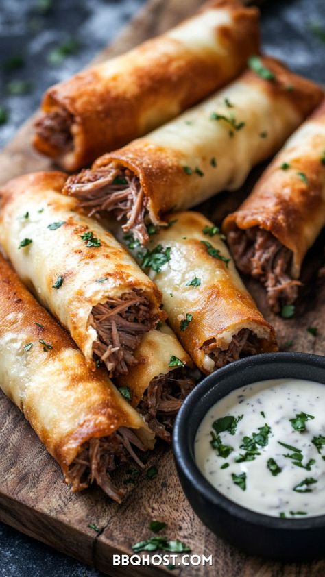 Looking for a mouthwatering Pulled Pork Taquitos recipe? These cheesy taquitos, paired with a smoky chipotle ranch dressing, are the perfect blend of BBQ flavor and creamy goodness. Perfect as a meal or appetizer, these taquitos are made with tender pulled pork wrapped in flour tortillas. Pin this for later and check out the blog for the full recipe! Bbq Pork Wraps Tortillas, Pork Tortilla Wraps, Pork Taquitos Baked, Pork Carnitas Meal Ideas, Late Night Appetizers, Taquitos Pork, Taquitos With Flour Tortillas, Pork Quesadilla Recipes, Pulled Pork Appetizers