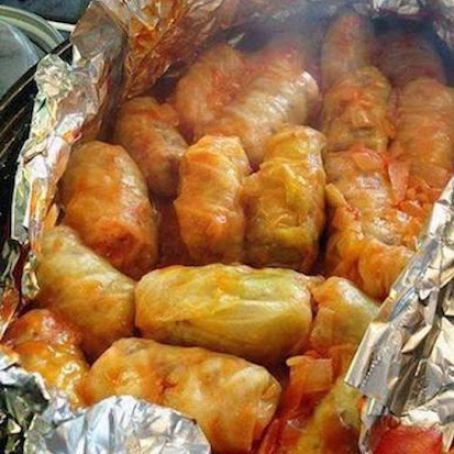 STUFFED COUNTRY STYLE CABBAGE ROLLS Recipe - (4.2/5) Smoked Cabbage, Vegetable Cocktails, Mandarin Orange Salad, Baked Cabbage, Canned Tomato Soup, Cabbage Rolls Recipe, Savoy Cabbage, Chicken Rolls, Orange Salad