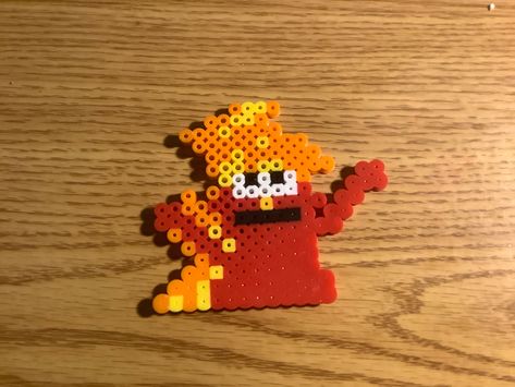 This is made out of perler beads @art_slaysss_all_day24 on tiktok Fuse Bead Art Ideas, Group Perler Beads, The Lorax Perler Bead, Fuse Bead Patterns Rave, Meme Perler Beads Pattern, Funny Perler Beads Ideas, Elmo Perler Beads, Perler Bead Patterns Sea Animals, Fusion Beads Patterns