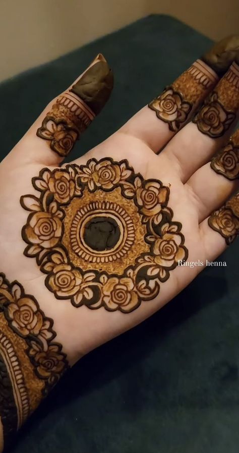 Henna designs are intricate and beautiful body art, often used for celebrations and special occasions. They feature floral patterns, geometric shapes, and delicate swirls, each carrying cultural significance and personal meaning. Applied on hands and feet, henna designs add a touch of elegance and tradition, making every event memorable.#hennadesigns, #hennaart, #mehndi, #bodyart, #hennaartist, #traditionals, #mehndipatterns, #celebrationart, #floralhenna, #intricatedesigns Mehndi Unique Design, Simple Mehandi Designs Aesthetic Back, Mehandi Designs For Hands Unique Simple, Indian Mehndi Designs Unique, Front Mehndi Designs Simple Unique, Modern Mehndi Designs Unique Back, Pakistani Mehndi Designs Simple, Back Hand Mehndi Designs Simple Unique, Palm Mehndi Design Simple