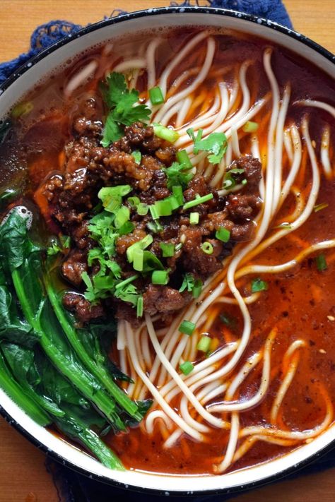 Saozi Mian (臊子面) A staple of Sichuan noodle restaurants – a bowl of this will leave you satisfied but still wanting more. The noodles swim in a hearty broth topped with delicious minced pork and fragrant scallion. Spicy Schezwan Noodles With Beef, Szechuan Beef Noodles, Sichuan Noodle Soup, Sichuan Cold Noodles, Sichuan Recipes, Sichuan Noodles, Taiwanese Spicy Beef Noodle Soup, Pork Noodle Soup, Dragon Breath