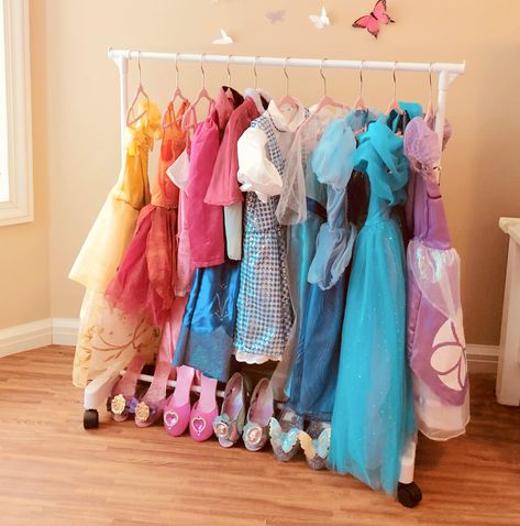 PRICES MAY VARY. Comes with 10 Kids velvet hangers! Velvet hanger color may vary slightly Use with or without wheels (included) CGR-10P Features: -Rack includes 10 velvet hangers. -Free-standing short garment rack perfectly sized to organize children's clothing. -Store, hang, and organize kid's clothes. -End caps keep clothing securely in place. Product Type: -Nursery Hanger. Intended Use: -Skirt/Pants/Tie/Belt/Suit/Dress/Shirt. Primary Material: -Metal. Dimensions: Overall Height - Top to Botto Dress Up Clothing Rack, Princess Dress Organization, Kids Dress Up Area, Dress Up Storage Diy, Toddler Dress Up Station, Dress Up Storage Ideas, Kids Dress Up Storage, Play Closet, Dress Up Rack