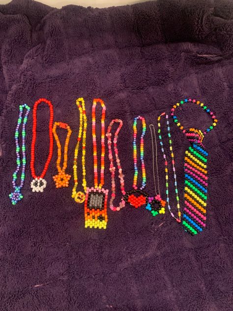 Scene kid kandi bead necklaces rainbow black orange red skull blue green purple gameboy pink yellow Scene Kandi Patterns, Perler Beads Necklace, Scene Bracelets Ideas, Kandi Necklace Ideas, Kandi Necklaces, Scene Kid Aesthetic, Scene Bracelets, Scene Necklace, Scene Kandi