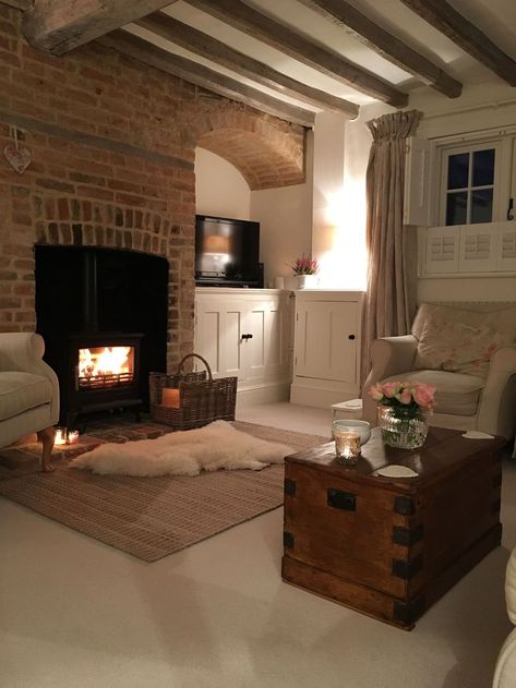 Cosy Farmhouse Exterior, French Gite Interior, Red Brick Chimney Living Room, Red Brick House Interior Living Rooms, Cosy Den Ideas, Red Brick Fireplace Decor Ideas, Cosy Basement Ideas, Brick Chimney Living Room, Red Brick Fireplace Living Room