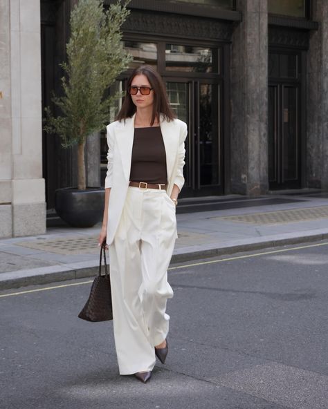 Happy weekend🤍any good plans? White suit @mudvii_ 🇱🇹🫶🏻 Bag @dragon.diffusion Shoes @bobbies Sunglasses @vehlaeyewear White suit, street look, minimal style, classic style, capsule wardrobe, effortless style, women suit, boss vibes. White Blazer Outfit, Style Capsule Wardrobe, White Blazer Outfits, Boss Vibes, Style Capsule, Dragon Diffusion, Trousers Outfit, Trouser Outfit, White Suit