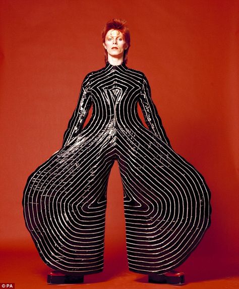 Wacky: A striped bodysuit designed by Kansai Yamamoto for the 1973 Aladdin Sane tour. The museum picked out 60 stage costumes as well as photography, film, music videos, set designs and storyboards Designer Overalls, Duncan Jones, David Bowie Ziggy, Kansai Yamamoto, Anthony Kiedis, Designer Jumpsuits, Let's Dance, Ziggy Stardust, Striped Bodysuit