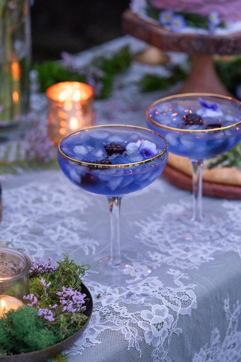 Jump to Recipe Elegant Drinks Aesthetic, Witchy Tea Party Food, Mid Summer Nights Dream Party Food, Self Care Mocktails, Midnight Tea Party, Blue Tea Recipe, Enchanted Forest Cocktails, Floral Mock Tails, Enchanted Forest Drinks