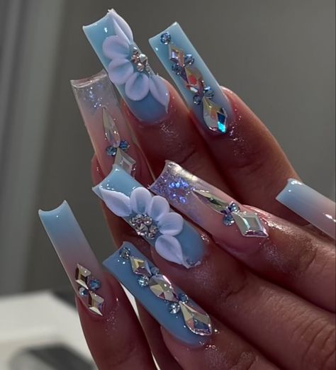 Long Acrylic Nails Coffin With Gems, White Nails With Designs With Diamonds, Long Blue Nails With Design, Nail Designs For Quinceanera Blue, Nail Ideas Mexican Style, Cinderella Theme Quinceanera Centerpieces Table Decorations, Royal Blue Acrylic Nails 3d Flower, White With Blue Quinceanera Dresses, Blue And Gold Butterfly Nails