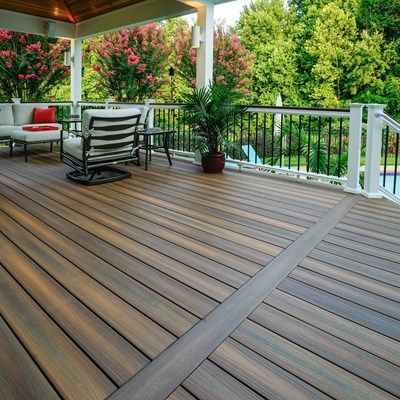 This first level deck is covered by a 14'x14' pavilion. A small lower level is dedicated for grilling. Deck is covered below with a heavy duty lattice Grilling Deck, Trek Deck, Deck Renovation, Deck Restoration, Deck Remodel, Deck Makeover, Deck Pictures, Deck Colors, Patio Deck Designs