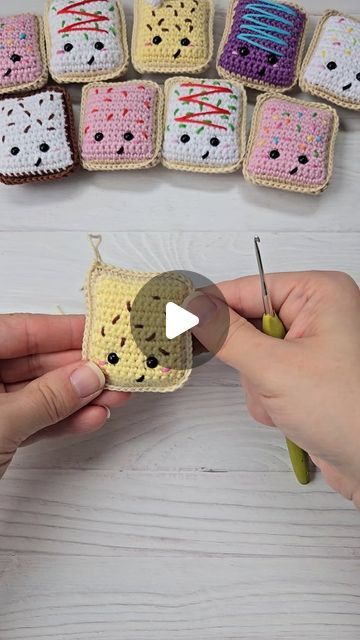 Ashley | Pocket Hug crochet gifts + patterns on Instagram: "🧶✨️Crochet with me!  I'm working on a special holiday edition eggnog poptart pocket hug!   Whether you're looking for a thoughtful stocking stuffer, a sweet little gift, or something fun and quick to crochet, I've got you covered! 💌   Pocket hugs and patterns are available in my shop, and the best part is everything in my shop is 25% off, now through Dec 4th! 🎉  Which poptart flavor is your favorite? 💕👀  #crochetwithme #poptartpockethug #crochetpockethugs #eggnog #crochetreel #stockingstuffers #holidaygifting #onetsy #etsyseller #shophandmadethisholidayseason #crochetcommunity #crochetpattern #handmadefortheholidays #supportsmallbusiness" Crochet Poptart Free, Crochet Poptart Keychain Pattern, Crochet Popcorn Pattern, Crochet Pop Tart, Crochet Gifts Patterns, Crochet Poptart, Crochet Pocket Hug, Crochet With Me, Pocket Hugs