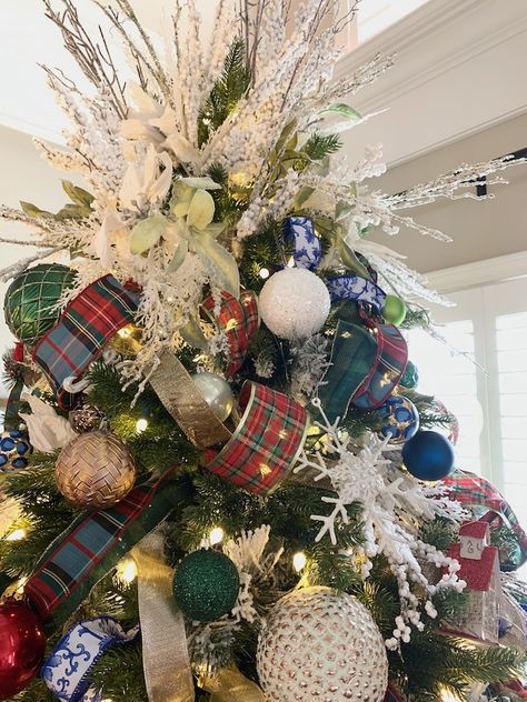 Flocked Tree With Traditional Ornaments, Navy Tartan Christmas, Chinoiserie And Plaid Christmas Tree, Red Gold Navy Christmas Tree, Blue Red Silver Christmas Tree, Blue Tartan Christmas Tree, Tartan Ribbon Christmas Tree, Royal Stewart Tartan Christmas, Tartan Plaid Christmas Tree Ideas