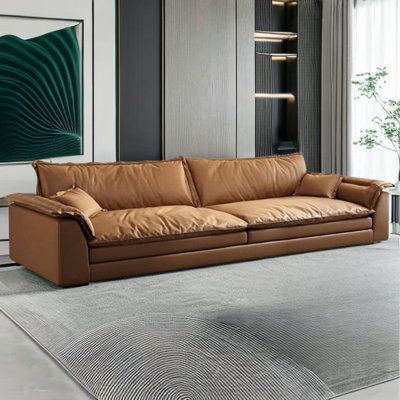 Leather Couch Sunroom, Comfortable Living Room Sofa, Long Couches Living Room, Leather Sofa And Accent Chairs, Cozy Sofa Deep Couch, Vintage Couch Living Room, Zen Interior Design Living Room, Mid Century Modern Leather Couch, Brown Leather Couch Decor