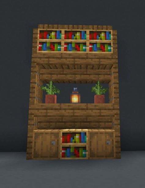 Small and easy Minecraft project idea for a tall spruce bookshelf. Add this to your list of simple Minecraft building ideas today! #minecraft Cute Minecraft Bookshelf Ideas, Minecraft Small Room Designs, What To Add To Your Minecraft House, Minecraft Small Living Room Ideas, Bookshelf Design Minecraft, Small Storage Room Minecraft, Simple Cute Minecraft Houses Easy, Book Shelf Minecraft, Small Decorations Minecraft