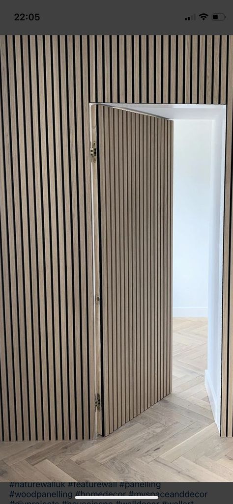 Slatted Door Ideas, Slat Wood Door, Slat Doors, Slat Wall With Door, Hidden Slat Door, Wooden Slat Door, Fake Doors On Walls, Slat Wall Door, Slat Wall Secret Door