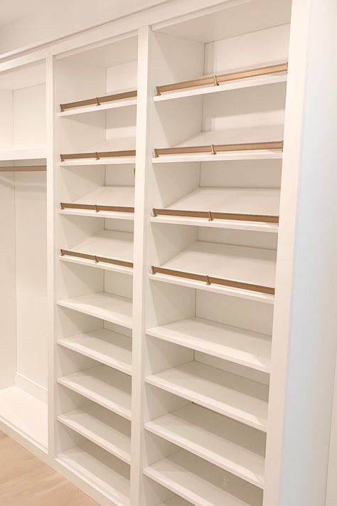 The only thing missing is the shoes! Your shoe rack plays an important role in your closet's organization, allowing you to neatly organize your shoes in any way that works for you. 📸: The Tailored Closet of Nashville Wardrobe Design Shoe Rack, Master Walk In Closet Shoe Storage, Walk In Closet Ideas With Shoe Rack, Shoe And Accessory Closet, Master Closet Shoe Shelves, Shoe Rack In Walk In Closet, Built In Shoe Shelves Closet, Shoe Wall In Closet, Shoe Closet Design Ideas