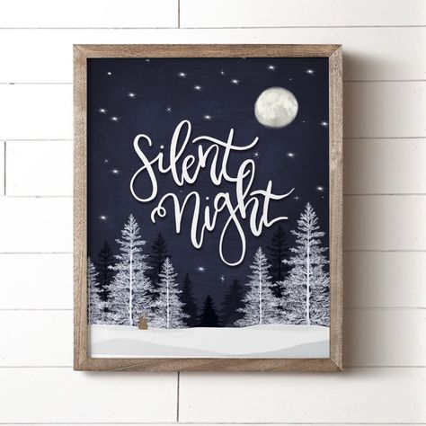 "Silent Night. Holy Night. All is calm. All is bright. This beautiful Christmas song captures the essence of the holiday season. The words \"Silent Night\" are surrounds by a dark and peaceful sky with treetops lit by the light of the moon. Perfect as a stand-alone piece or with a farmhouse gallery wall grouping. Available in 8\"x10\". Printed on acid-free, high-quality card stock and backed with heavy-gauged cardboard. Frame not included. ✔️Available in 8\"x10\" ✔️Frame and matte are not includ Christmas Tree Artwork, Christmas Chalkboard Art, Farmhouse Gallery Wall, Art Christmas Tree, Silent Night Holy Night, Christmas Canvas Art, Night Christmas, Christmas Chalkboard, Christmas Artwork