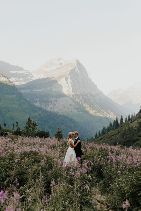 Megan and Gunnar shared their private vows to each other outside Glacier National park before celebrating with friends and family at Under Canvas. Nature Elopement Photos, Wedding In The Mountains Colorado, Mountain Small Wedding, Small Wedding Mountains, Wedding Mountain Theme, Simple Mountain Wedding, Small Mountain Wedding, Mountain Wedding Colors, Glacier Park Wedding