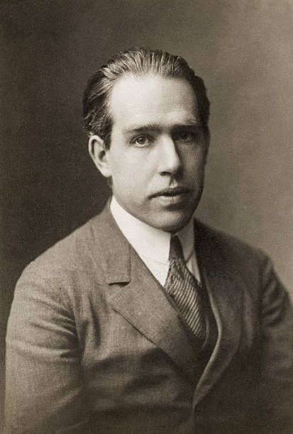 Portrait of Niels Bohr Danish physicist Proposed a theory of atomic structure based on Planck's quantum theory and was awarded the 1922 Nobel Prize... Atomic Theory, Niels Bohr, Nobel Prize In Physics, Atomic Structure, Theoretical Physics, Physicists, Quantum Mechanics, Atomic Age, French Photographers