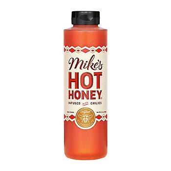 Mike's Hot Honey is a sweet-heat combo of honey infused with chili peppers that adds the perfect kick to just about any food or drink. Founded by Mike Kurtz in New York City in 2010, Mike's Hot Honey has grown via word-of-mouth sensation to become America's leading brand of hot honey. Use this spicy and sweet condiment in a variety of dishes.  Product Features:  * Sweet-heat combo of honey infused with chili peppers * Quick and easy way to add the perfect kick to your favorite foods * Drizzle it on pizza or wings, pair it with cheese, and add it to cocktails or tea * Made with 100% pure honey, real chili peppers, and vinegar * Certified Kosher * All natural, gluten-free * Contains no artificial sugar or preservatives * Easy pour bottle * Includes hot honey condiment, 24 oz.   Ingredients: Mikes Hot Honey, Cornbread Biscuits, Honey Label, Acacia Honey, Barbecue Ribs, Best Honey, Sweet Heat, Hot Honey, Honey Syrup