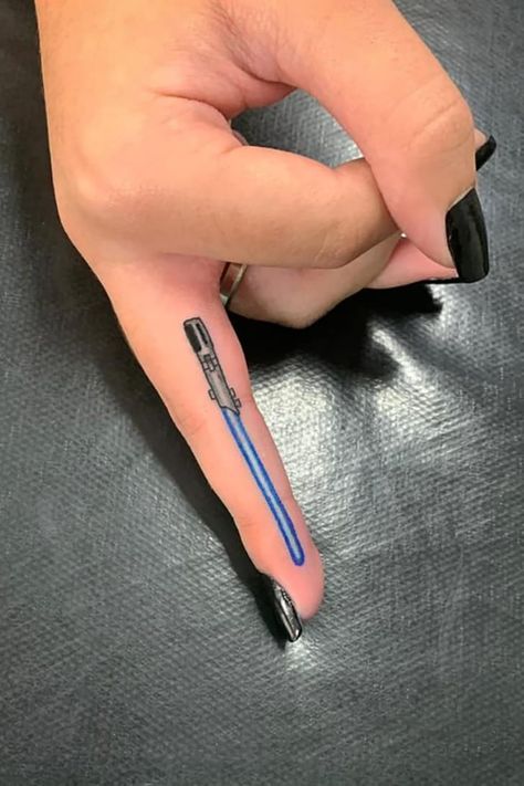 Finger Lightsaber Tattoo, Starwars Lightsaber Tattoos, Lightsaber Finger Tattoo, Lightsaber Tattoo, Sick Tattoos, Polynesian Tattoos, Number Tattoos, Meaningful Tattoos For Women, 4 Tattoo