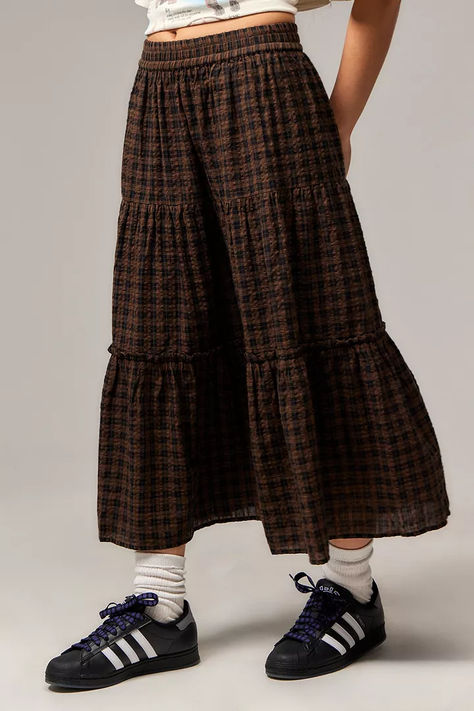 The Ceilia midi skirt feautres an all-over preppy check print. Cut from cotton FT, an elasticated regilar- rise waist, tiered silhouette and midid hem. Tailor Clothes, Skirt With Boots, Utility Trousers, Skirt Tiered, Lily Calloway, Tailored Clothes, Autumn Winter Outfits, Tiered Midi Skirt, Tiered Skirts