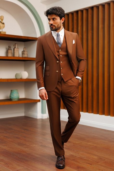 Indulge in the versatility of our Brown Slim-Fit Suit 3-Piece, perfectly suited for formal events and business settings, ensuring a smart and stylish appearance that never goes unnoticed. #slimfitsuit #mensfashion #suitup #dapperstyle #groomstyle #weddingattire #specialoccasion #formalwear #classiclook #suit #suits Mens Fall Suits, Blazer Waistcoat, Suit For Men Wedding, Grooms Men, Suit For Wedding, Dapper Suits, Engagement Dinner, Men's Business Suits, Brown Suit