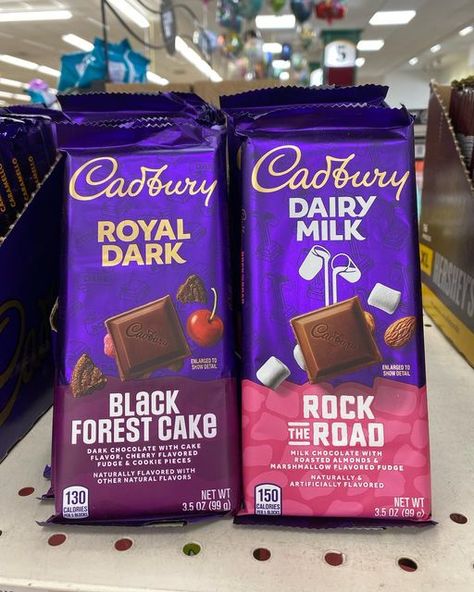 Snacking Life on Instagram: "Cadbury has two new chocolate bars! They have Black Forest Cake and Rock the Road. Black Forest Cake: Dark chocolate with cake flavor, cherry flavored fudge, and cookie pieces. Rock the Road: Milk chocolate with roasted almonds and marshmallow flavored fudge. Both sound good to me! Which one would you try? * * #chocolate #candy #marshmallows #darkchocolate #cookies @cadburyusa @hersheys @hersheycompany #summer #icecream" Flavored Fudge, Cake Dark Chocolate, Australian Snacks, Cadbury Chocolate Bars, Fountain Wedding Cakes, Cadbury Caramel, Chocolate Fantasy, Hershey Chocolate Bar, Fudge Cookies