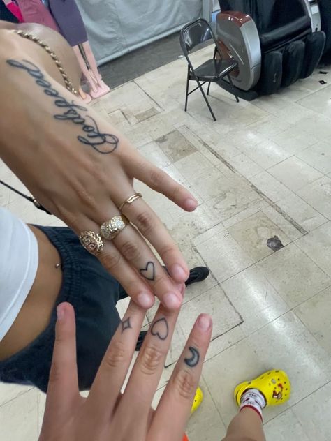 777 Godspeed Hand Tattoo, Name Hand Tattoos For Women, Hand Tattoo Script, Couple Tattoos Black Couples, Cursive Hand Tattoo, Heart Tattoo On Hand, Heart Hand Tattoo, Heart Finger Tattoo, Demon Tattoos