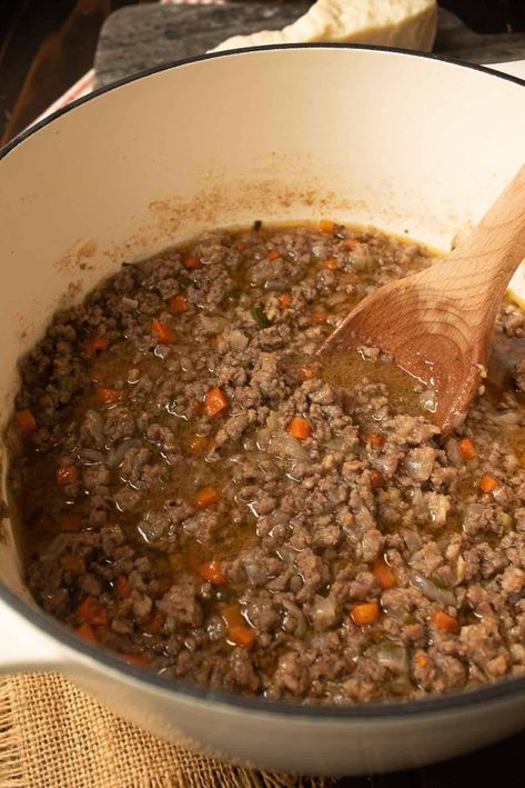 White Traditional Bolognese Sauce (ragù bianco alla Bolognese is a classic Italian meat sauce that is a little different as it has no tomato sauce. Ground beef, Italian sausage, wine and herbs make for a very flavorful sauce best served with wide pasta pappardelle, rigatoni or gnocchi. #whitebolognese #ragusauce #meatsauce #notomatosauce White Bolognese, No Tomato Sauce, Pasta Pappardelle, Traditional Bolognese, Beef Ragu Recipe, Italian Meat Sauce, Bolognese Sauce Recipe, Ragu Sauce, Tagliatelle Pasta