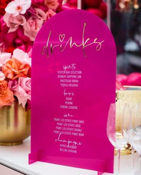 adelphi mou on Instagram: “Honestly - This drinks sign is everything!⁠ ⁠ Pink Acrylic, Gold Vinyl & White Print! Stunning!⁠ ⁠ A celebration for a baby girl in the…” Pink Wedding Signage, Pink Signature Drink, Drink Menu Design, Drinks Sign, Pink Bar, Tropical Bridal Showers, Pink And Gold Wedding, Cocktails Sign, Signature Drinks Sign