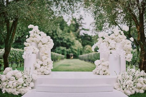 Pillar Wedding Arch, Floral Wedding Ceremony Arch, Wedding Seating Ceremony, Flower Arch Wedding Ceremony, Wedding Stage Setup, Floral Plinths Wedding Ceremony, White Wedding Stage, White Hydrangeas Wedding, Wedding Backdrop Ceremony