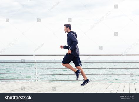 Side view portrait of a sports man running near sea #Ad , #Sponsored, #portrait#view#Side#sports Running Side View, Side View Portrait, Running Pose, Person Running, People Poses, Creative Icon, Design Graphics, Icons Design, Man Running