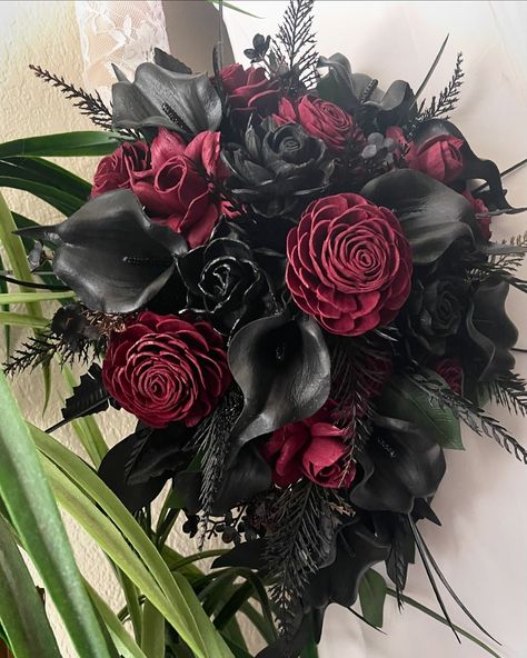 Black and Burgundy Bouquet and Boutonniere shipping off to PORTLAND, OR #foreverflowersbygigi #bouquet #boutonniere #cascadingbouquet #gothicbouquet #moodywedding #darkromance Red And Black Cascading Bouquet, Red And Black Wedding Bouquets, Goth Bouquet Wedding, Dark Flowers Bouquet, Goth Flower Bouquet, Red And Black Bouquets, Gothic Flower Bouquet, Black And Red Bouquet, Dark Wedding Bouquet