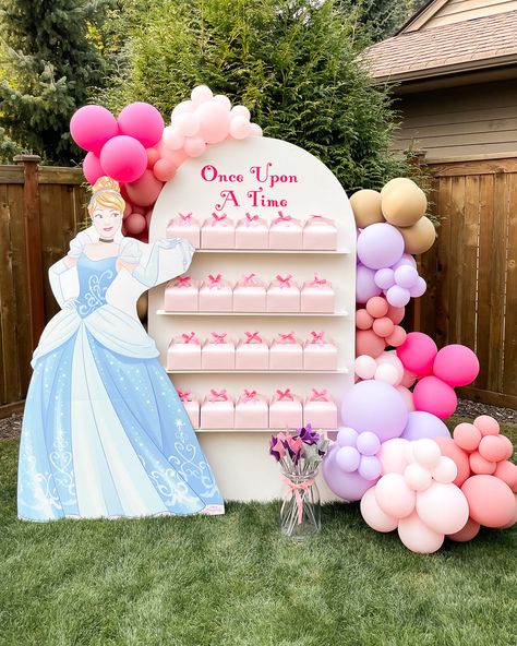 Olivia's 3rd Disney Princess Birthday Party | Just A Tina Bit Pink Favor Boxes, Once Upon A Time Balloon Garland, Party Favors Wall, Once Upon A Time Themed Party, Princess Theme Table Decorations, Once Upon A Time Princess Party, Princess Party Balloon Garland, Once Upon A Time Party Favors, Princess Theme 3rd Birthday Party