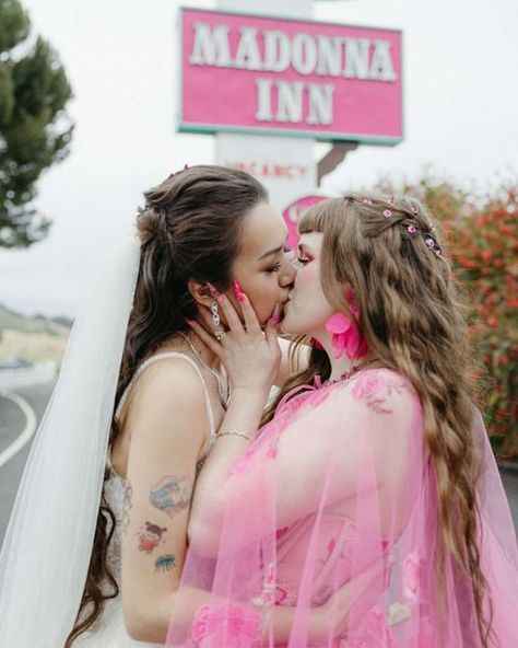 Rock n Roll Bride Magazine on Instagram: "Once upon a time in the middle of a pandemic, Ellysa and Jaimy met on Hinge. They moved in together in 2021 and planned a quick getaway to their dream lodging, The Madonna Inn in San Luis Obispo, CA. While they were there, they couldn’t stop talking about how much the place just felt like them, and even though they weren’t even engaged, spoke about how one day they would get married there! Want to see more from their pink, fairytale matrimony?! Of course you do! Head to rocknrollbride.com or the link in our story today to go straight there! Couple @justellysa @jajajaimy Photos @jessmcdolephoto Venue & Cake @madonnainn1958 Ellysa's Dress @chotronette Jaimy's Dress @davidsbridal Flowers @nisabeesbouquets #rocknrollbridemagazine #weddingplanning # Rock N Roll Bride Magazine, Entrance Songs, Madonna Inn, The Madonna, Quick Getaway, Rock N Roll Bride, Vow Book, Bride Magazine, Moving In Together