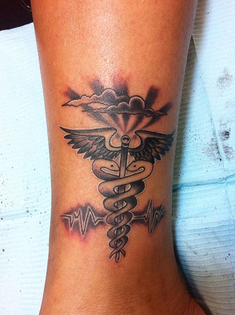 Medic symbol tattoo done by Facebook/Tattooedrob prez Instagram robdprez Medical Assistant Tattoo, Medic Tattoo, Medic Symbol, Nursing Tattoo, Nursing Tattoos, Medical Tattoos, Medical Alert Tattoo, St Tattoo, Princess Tattoos