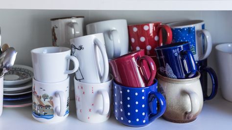 Stop Cramming Coffee Cups Into Stuffed Kitchen Cabinets: Try This DIY Instead - House Digest Diy Cabinet Storage, Pot Rail, Coffee Mug Storage, Coffee Cup Storage, Inside Kitchen Cabinets, Beautiful White Kitchens, Coffee Mug Collection, Mug Storage, Diy Cabinet