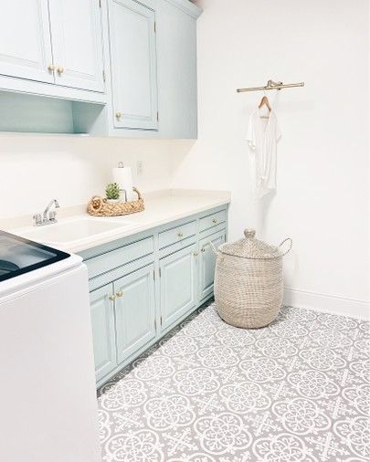 affordable peel and stick tile and DIY cabinet paints - pinterestingplans | LIKEtoKNOW.it Modern Laundry Room, Vinyl Flooring Bathroom, Floor Makeover, Sheet Vinyl Flooring, Modern Laundry, Bathroom Vinyl, Laundry Room Flooring, Peel And Stick Floor, Vinyl Floor Tiles