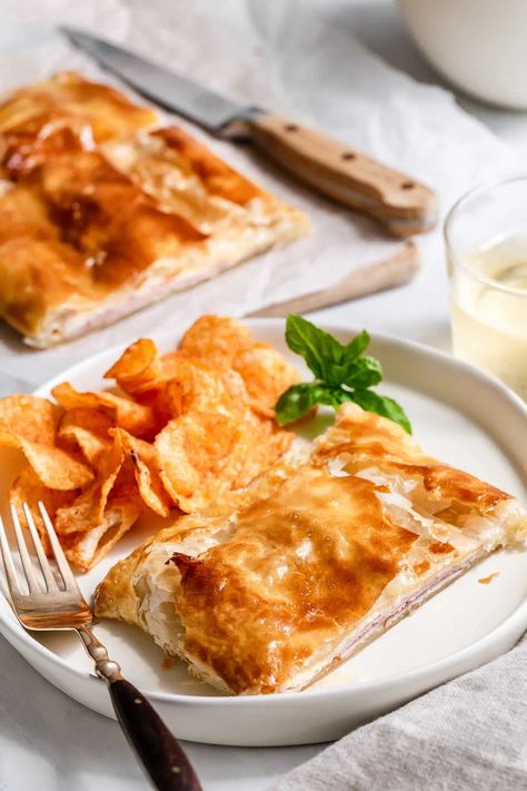 Ham and cheese puff pastry square on a plate with chips. Ham And Cheese Puff Pastry, Ham Cheese Puff Pastry, Puff Pastry Squares, Pastry Squares, Puff Pastry Recipe, Seafood Dinner Recipes, Puff Pastry Filling, Cheese Puff, Cheese Puff Pastry