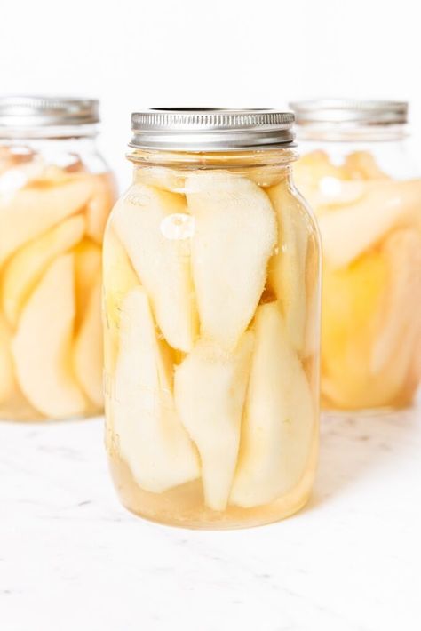 If you're looking for a straightforward, easy canning recipe, then this recipe for how to can pears is the one for you! A simple syrup is poured over sliced pears, and into the water bath they go. A few minutes later, the pears are ready to go for months to come! | wyseguide.com #canning #recipe #pears #preserving #fall How To Can Pears, Can Pears, Pear Recipes Easy, Peach Jalapeno Jam, Canning Pears, Beef Jerky Recipe, Pear Preserves, A Few Minutes Later, Wyse Guide