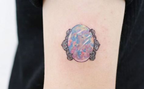 From heart-shaped amethysts, to full bracelets of iridescent crystals, we've compiled a list of 21 absolutely beautiful gem tattoos. (Page 4) of results Opal Tattoo, Bow Tattoo Designs, Stone Tattoo, Gem Tattoo, Jewel Tattoo, Crystal Tattoo, Tattoo Trend, Diamond Tattoos, Tattoo Sleeves